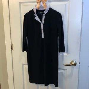 Black dress with 3/4 sleeves and button-down collar